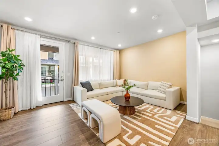Living room with access to covered balcony