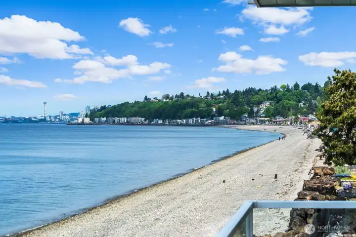 Spectacular views from the Space Needle all the way to the Olympic Mountain range from turnkey condominium home on Alki Beach.