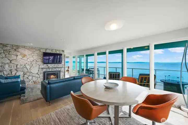 Cozy gas fireplace for chilly evenings and sliding glass doors to the covered deck.