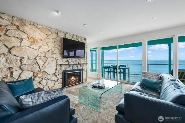 Access to the spacious covered deck enlarges the living space. Enjoy alfresco dining with the very best views!