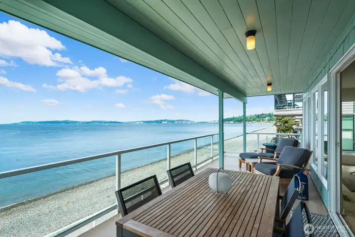 Covered deck offers unmatched views, what a spot to listen to the waves and unwind!