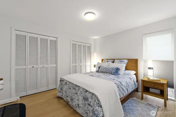 Guest bedroom with hardwoods, double closets and access to newly rebuilt bath.