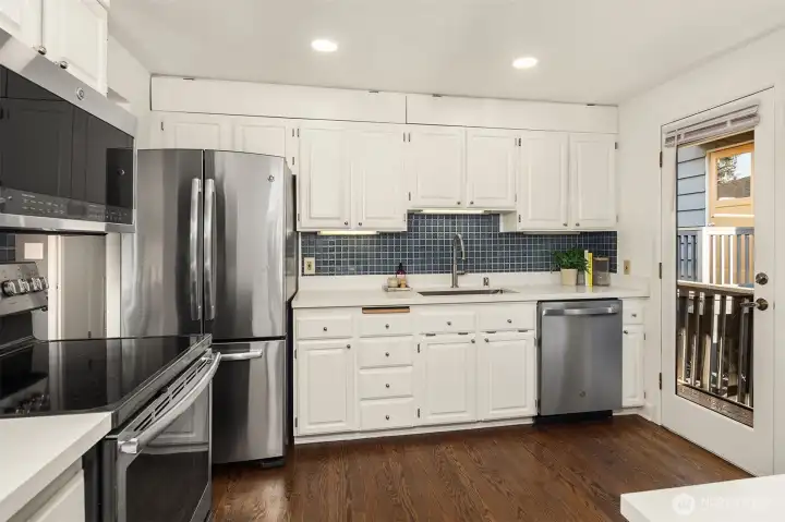 The kitchen features new quartz countertops and SS appliances The kitchen features new quartz countertops and SS appliances