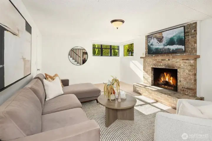 Lower level family room with wood burning fireplace Lower level family room with wood burning fireplace
