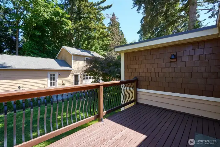 Back deck off upstairs suite Back deck off upstairs suite