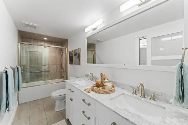 The finishes throughout this home are top-notch.  Heated floor in this beautiful bathroom.