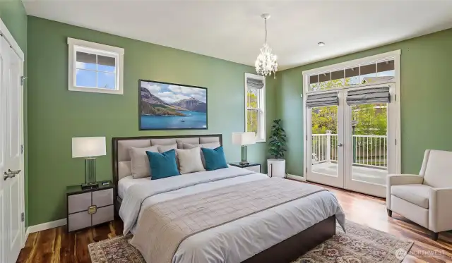 2nd bedroom includes double closets, a private deck, and custom lighting that casts a warm glow, creating a perfect blend of comfort and style. *Virtually Staged*