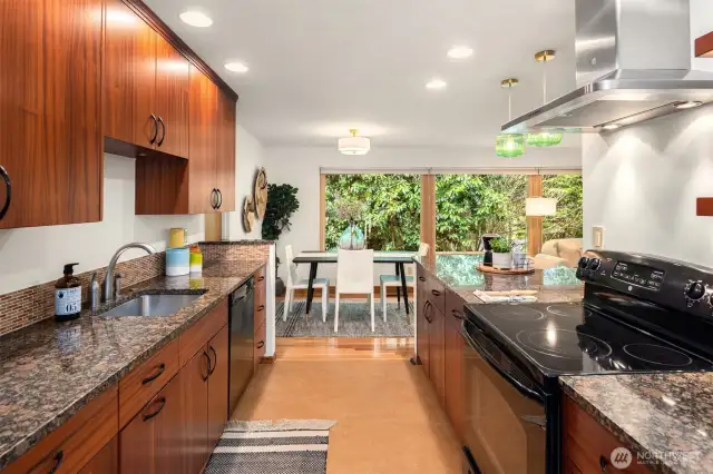 Open concept kitchen with granite counters