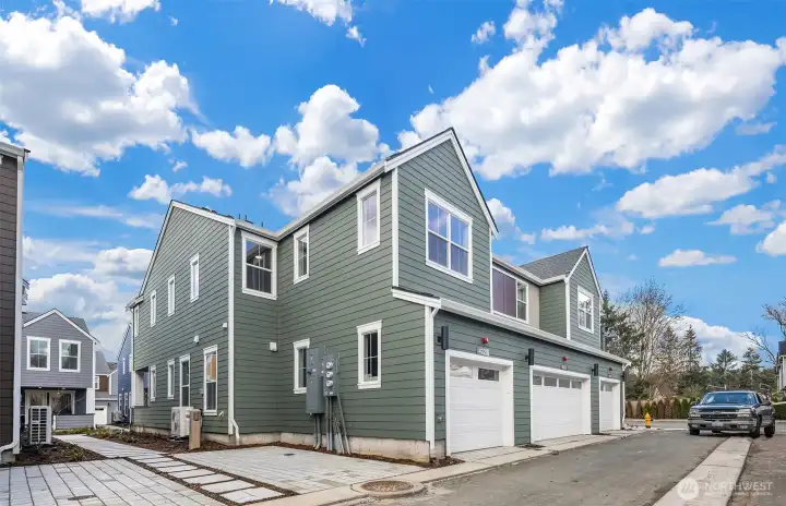 Rear of home with garage