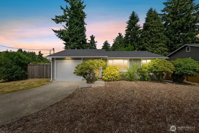 Welcome Home! Charming Front Yard Showcasing Excellent Curb Appeal!