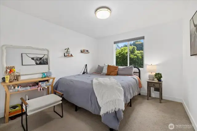 Inviting Primary Bedroom with a Cozy, Relaxed Atmosphere.