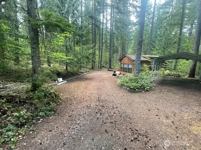 private drive with carport, shed and gazebo