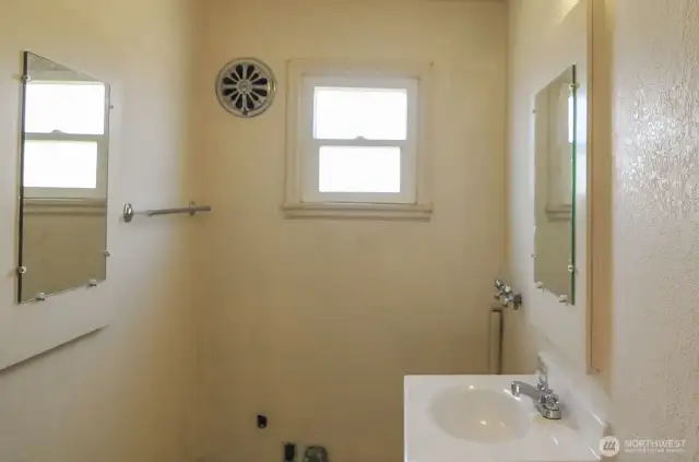 HALF BATHROOM WITH LAUNDRY HOOK UP