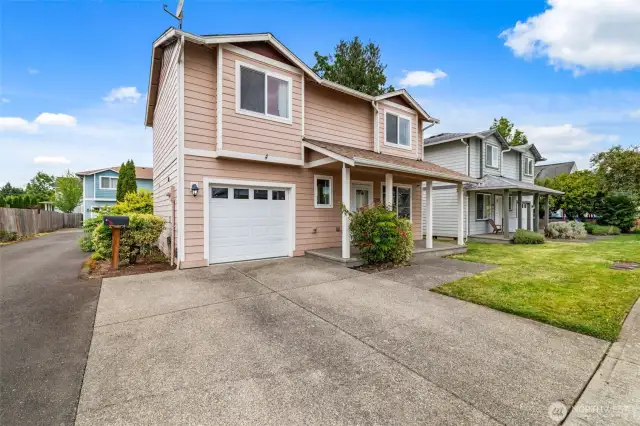 Spacious driveway + attached garage = plenty of room for your cars, guests & toys!