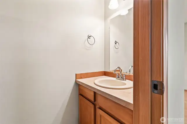 Main floor powder room = a must-have for guests and everyday convenience.