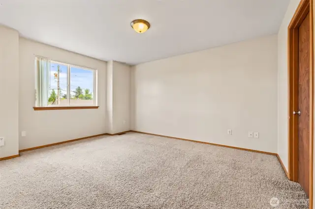 Start and end your day in style with this spacious primary suite featuring an ensuite and walk-in closet.