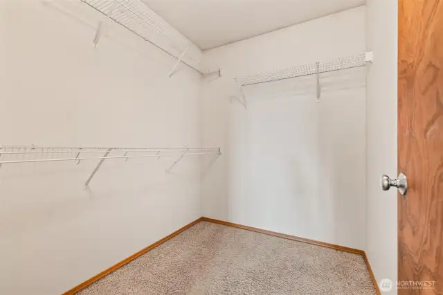 Goodbye clutter — hello spacious, functional walk-in closet.