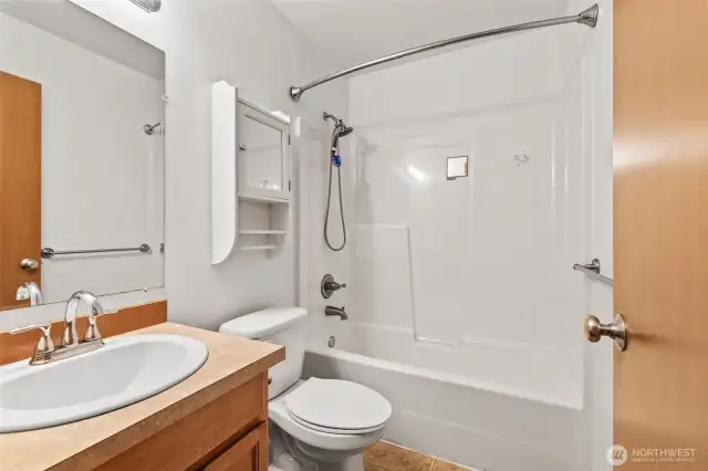 A spacious full bathroom upstairs, designed for convenience and comfort.