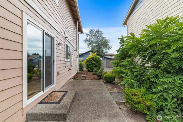 Small patio, big potential — great for grilling, plants, or quiet moments.