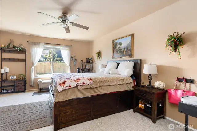 A spacious bedroom with walk-in closet and full bath