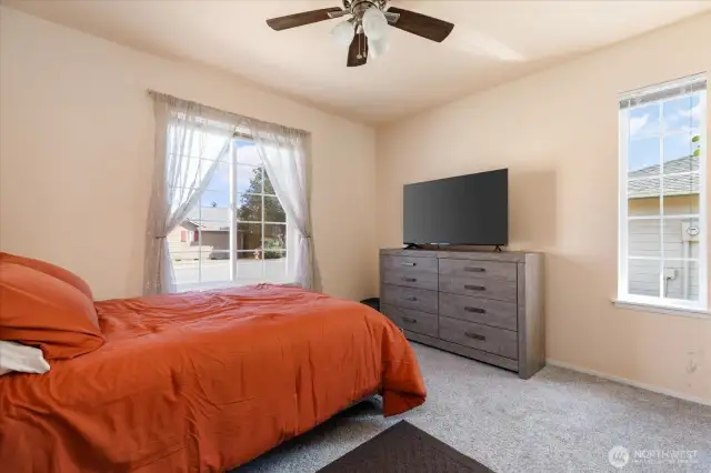 Across from the primary is second bedroom.