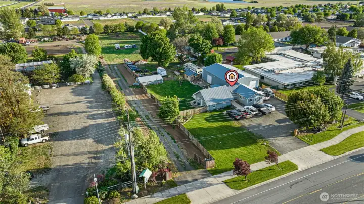 Duplex style dwelling with 60' x 40' Shop with car lift.