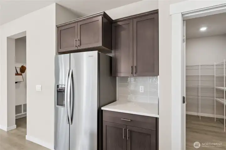 Coffee bar and soft close cabinets. Photo's are for representational purposes only. Colors and finishes may differ.