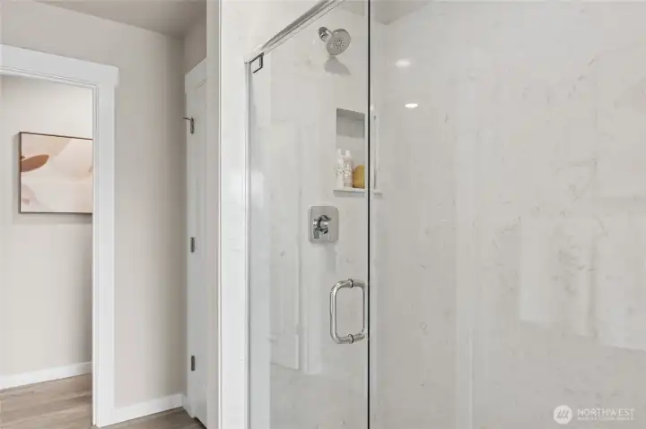 Marble surround shower. Photo's are for representational purposes only. Colors and finishes may differ.