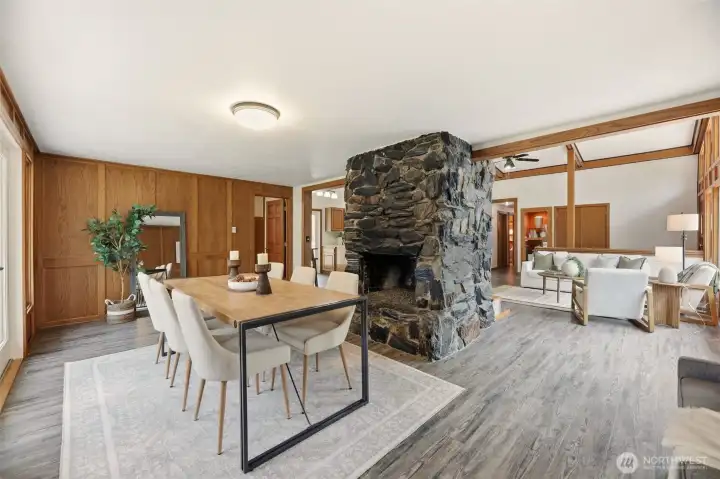 Dual sided fireplace anchors the great room.