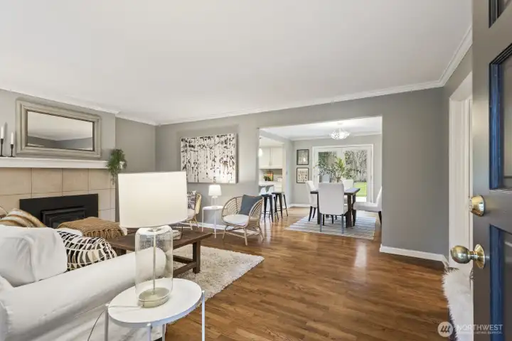 Rich hardwood flooring throughout the main living spaces add warmth and charm to this fantastic home.