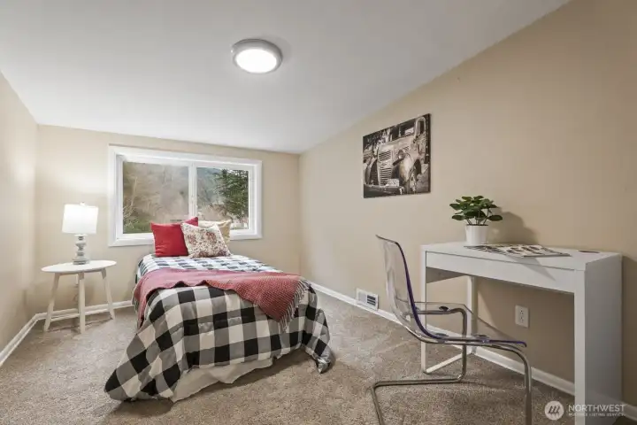 Upstairs bedroom #3 also features roomy closets.