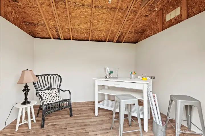Dedicated hobby or art studio featuring flooring and fully finished walls — ready for your creativity.