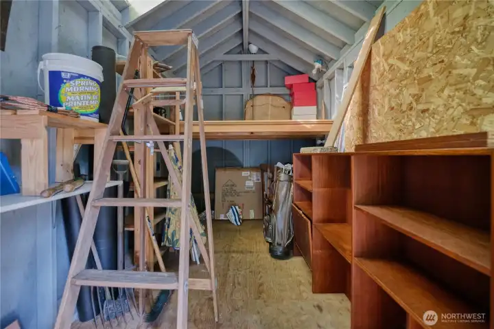 Everything in the bunkie stays with the property, including teak shelving.