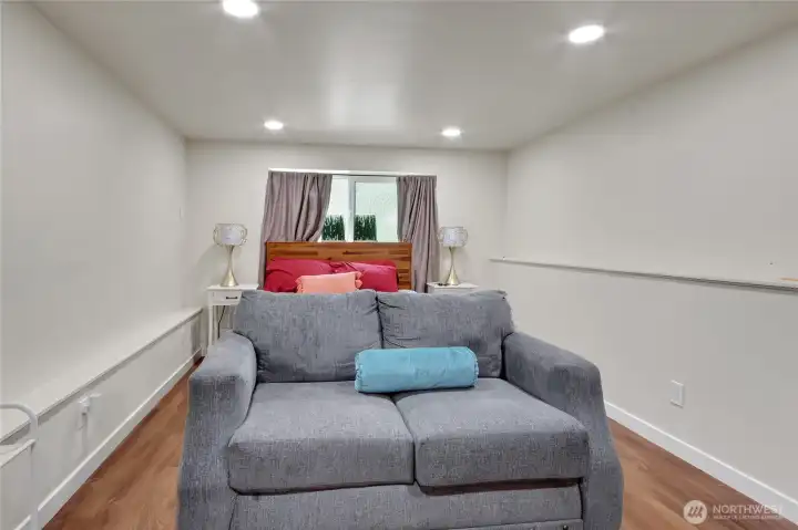 Bedroom 1 offers generous space with a large walk-in closet