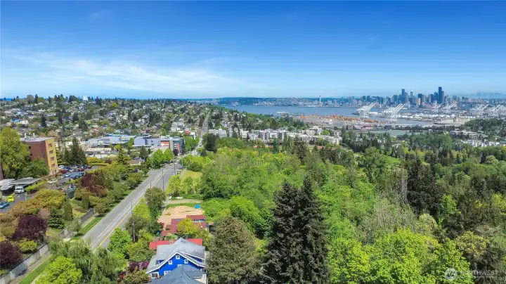West Seattle location accessed via a scenic drive with nearby water and city views