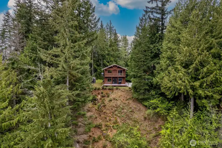 Surrounded by trees for privacy.