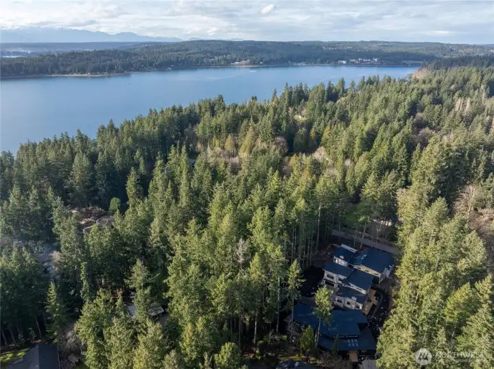drone photo showing proximity to Manzanita Bay with nearby beach access.
