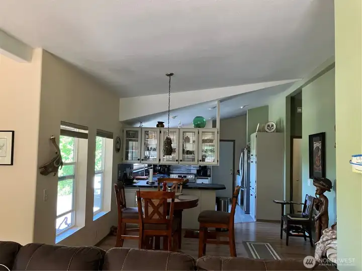 From the living room is a direct open dining room into kitchen