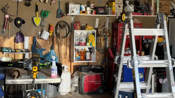 A garage that has a little bit of everything for the "honey do" list.