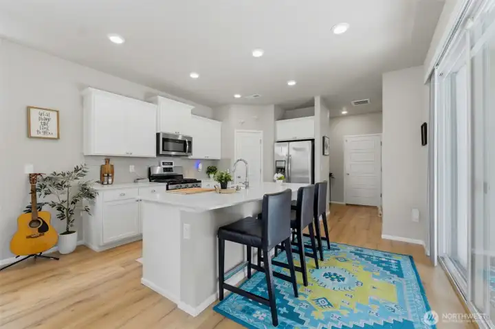 Bright kitchen with slider to your covered patio!