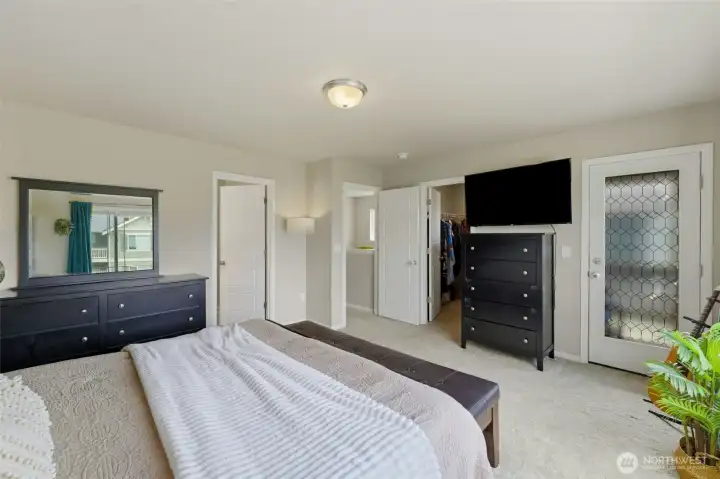 Primary bedroom has a large closet and door to your private patio!