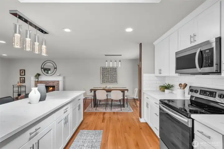 Modern kitchen with an expansive island open to the dining area