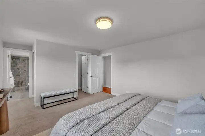 Primary bedroom featuring a spacious walk-in closet
