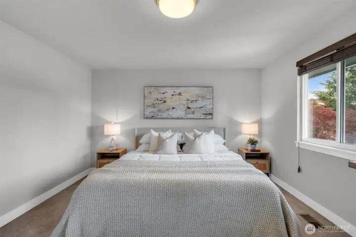 Another view of primary bedroom