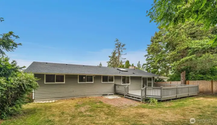 Back of the house highlighting the private lot with garden spaces