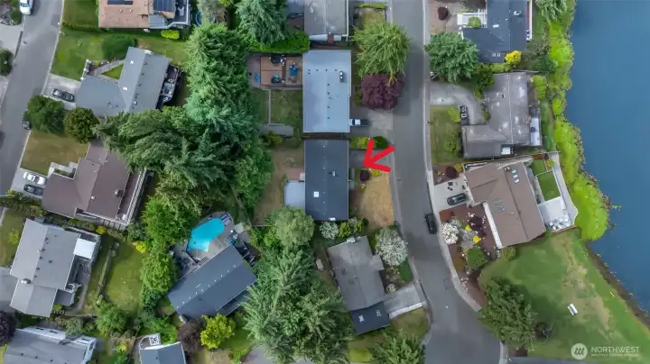 Aerial view highlighting the property's incredible stone's throw distance to the lake