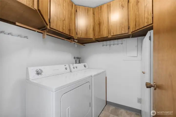 ample cabintery in the laundry room