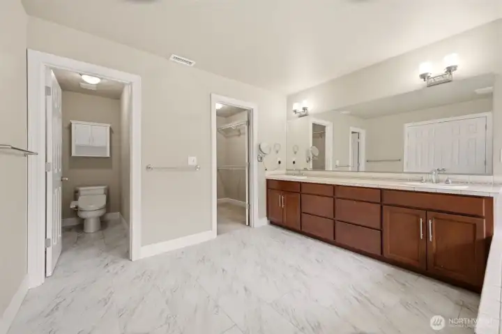 primary bathroom with privacy toilet