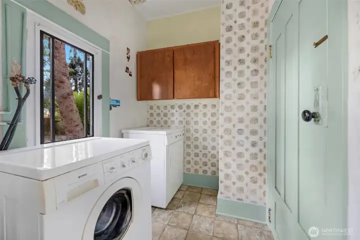 Laundry room off of kitchen Laundry room off of kitchen