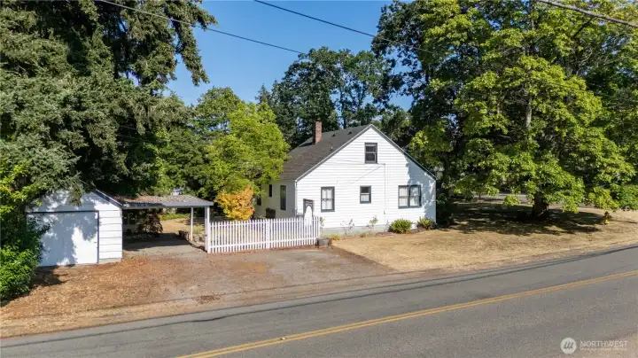 Side of house showing garage and carport